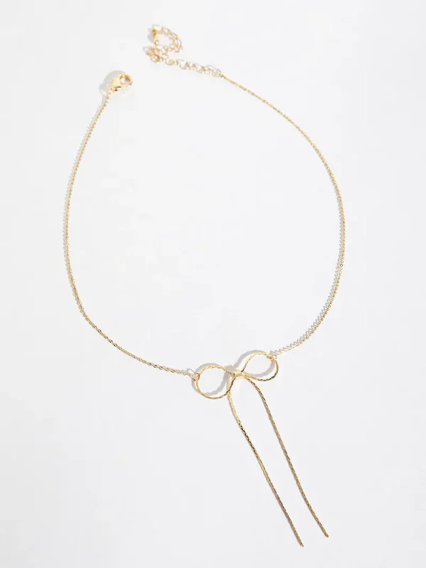 Ricki's Necklaces*-Plated Bow Necklace