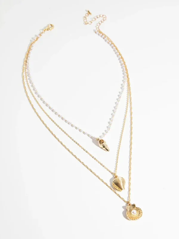 Ricki's Necklaces*-Plated Shell Pendant Necklace